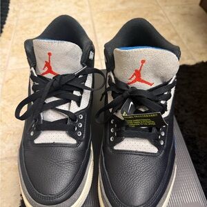 Jordan Black and White Sneakers with Red Accents